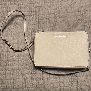 Grey Michael Kors cross body bag